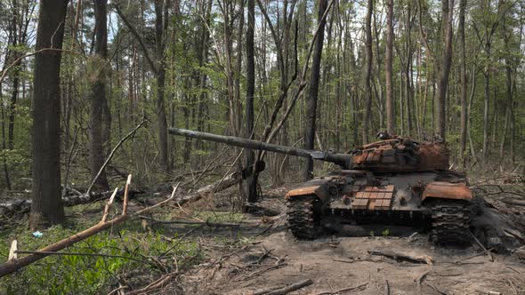 Destroyed and Burnt Tank of the Russian Army in the Forest