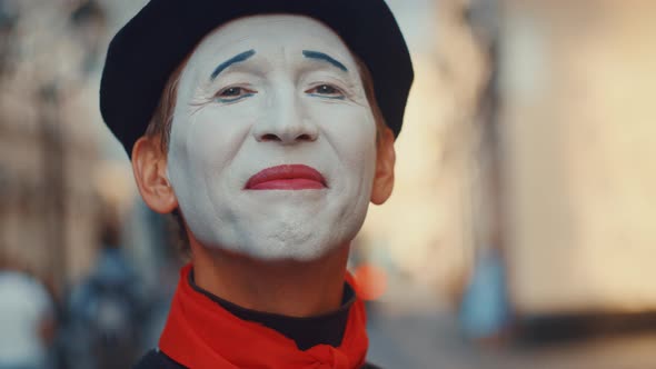 Smiling face of mime close up