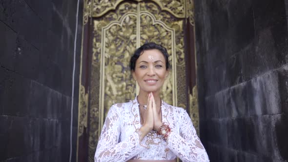 Portrait of Happy Peaceful Woman Praying in Buddhist Temple Religion Spiritual Places in Tropical