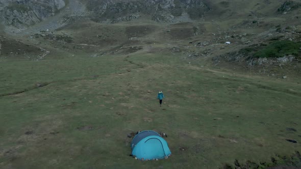 Aerial Drone View Over a Camp Site with Blue Tent By the Side of the Lake Ayous in the Pyrenees in