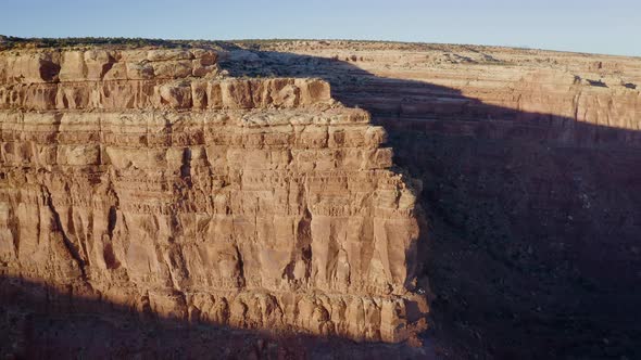 Aerial shot of the cliffs along the edge of Cedar Mesa in Southern Utah