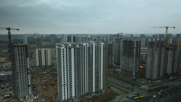 Construction of modern multi-storey buildings. Construction of a new city block.