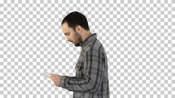Tablet computer Side view of man using, Alpha Channel