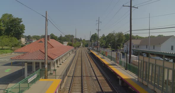 Pedestal Up Shot of Train Tracks and Station in Long Island