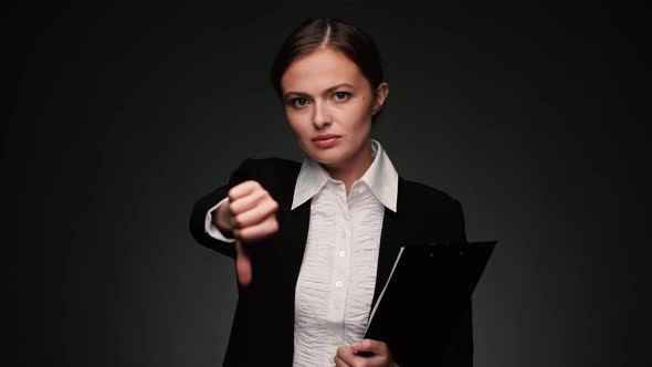 Brunette Business Woman with Giving Thumb Down