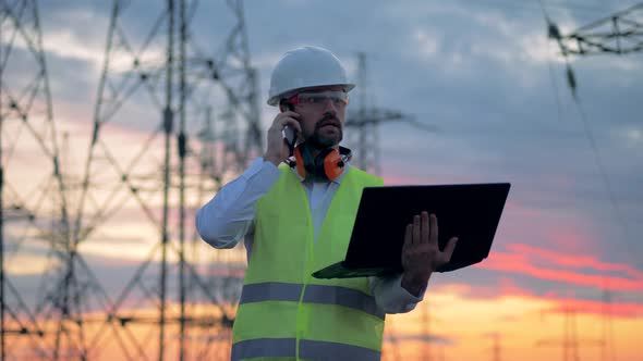 An Engineer Talks on His Phone