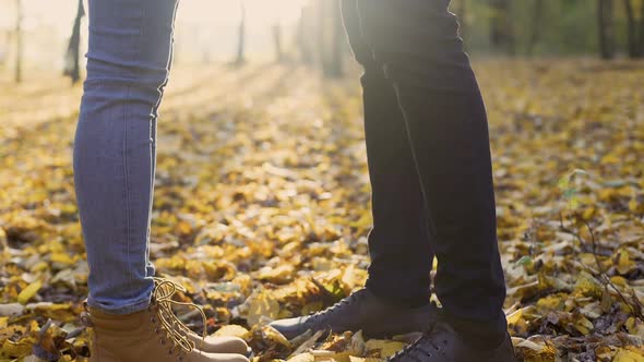 Couple of Young Lovers Tenderly Holding Each Other's Hands Enjoying Date