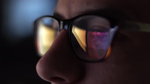 Man With Glasses Working At Night