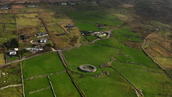 Loher Ringfort, Kerry, Ireland, March 2022. Drone orbits the ancient monument from the west at a hig