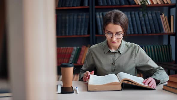 Focused Successful Intelligence Woman Reading Interesting Information Paper Book at Library