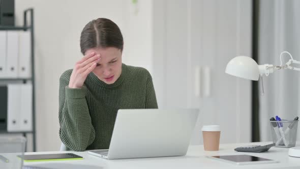 Young Woman Angry Using Laptop