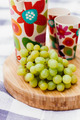 grapes and drinks on cutting board - PhotoDune Item for Sale