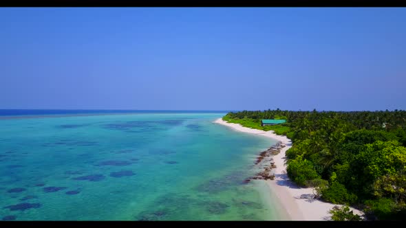 Aerial sky of tranquil bay beach lifestyle by blue sea and white sandy background of a dayout near r