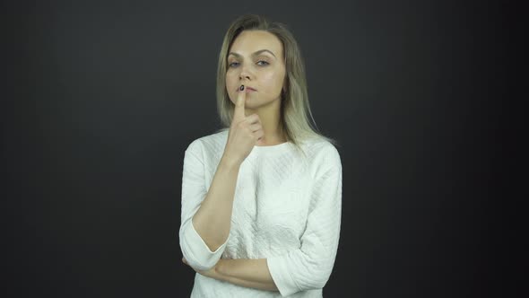 Thoughtful Young Woman Plays Etude Role Under Electric Light