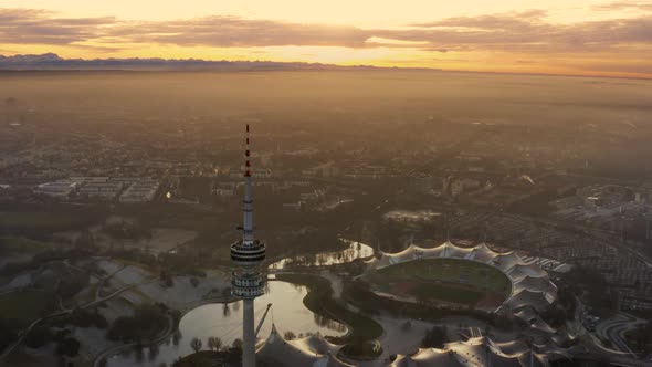 Aerial shot over Olympiaturm tower and Olympiapark in Munich Germany