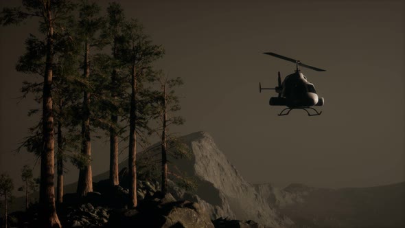 Extreme Slow Motion Flying Helicopter Near Mountain Forest