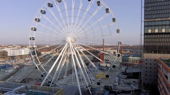 Hi-Sky Ferris Wheel, Munich, Germany. Aerial View of Landmark in Artist District on Sunny Summer Eve