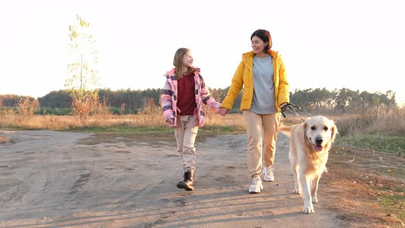 Family with Golden Retriever Dog