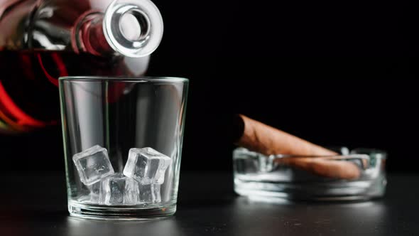 Brandy or Whiskey and Cigar Closeup