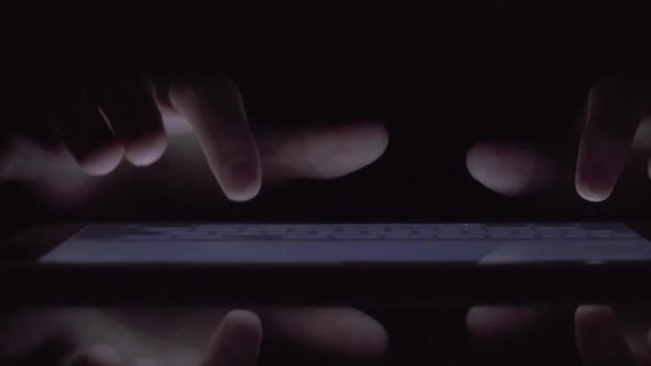 closeup finger touching tablet computer touchscreen