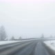 Car driving on mountain road covered with snow - VideoHive Item for Sale