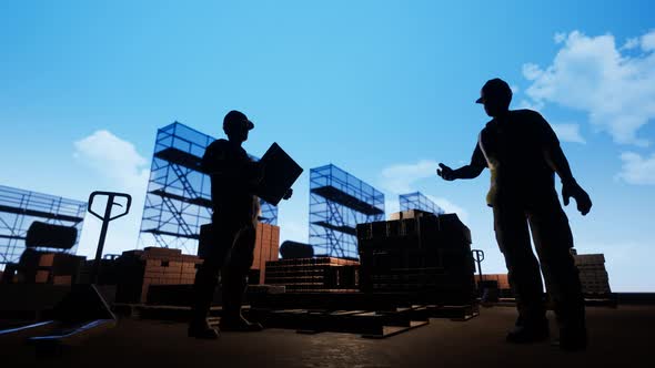 Construction Worker Looking At Blueprints