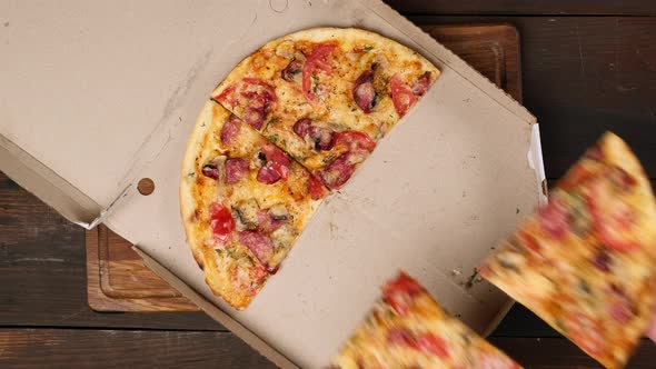 baked round pizza with cheese, tomatoes, sausage