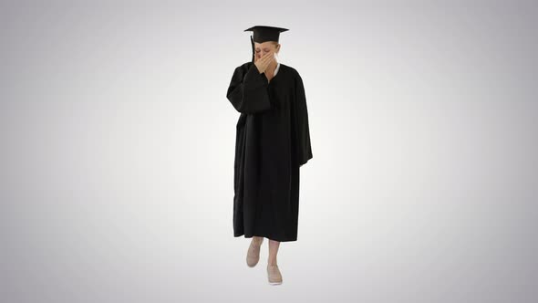 Young Graduate Woman Sick and Coughing While Walking on Gradient Background.