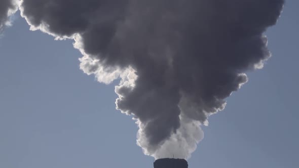 Smoke Stack with a Nice Smoke Over Blue Sky 006