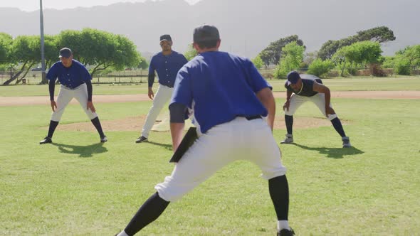 Baseball players stretching together