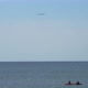 Airplane Flies Over the Sea - VideoHive Item for Sale