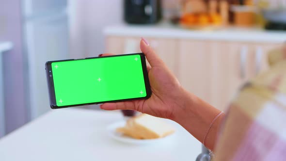 Watching a Video on Phone with Green Screen