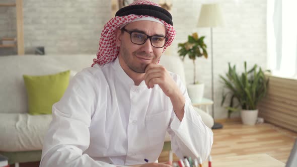 Portrait Arab Man Businessman at Work at a Laptop