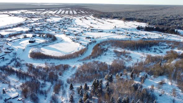 Aerial View From a Drone of a Small Village Winter Landscape Frosty Sunny Day Everything is Covered