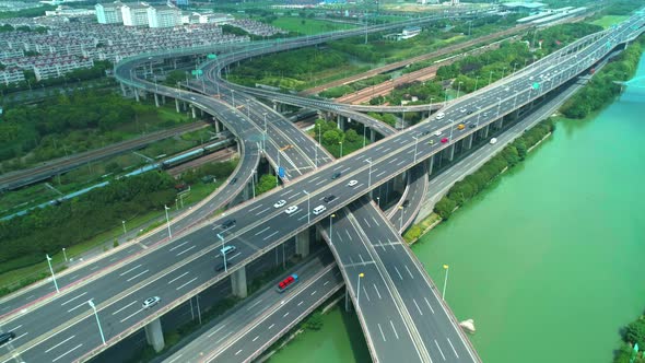 Aerial Drone View of Highway Multilevel Junction Road with Moving Cars at Daytime