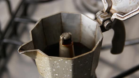 The process of making coffee in Italian moka pot