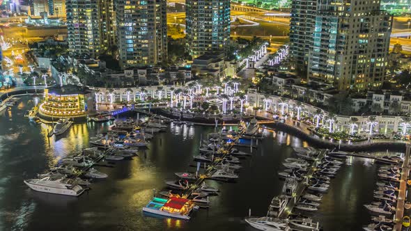 Beautiful Aerial Top View at Night Timelapse of Dubai Marina in Dubai UAE