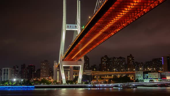 Nanpu Bridge Shanghai China Urban Cityscape  Skyline Panorama Timelapse at Night Zoom Out