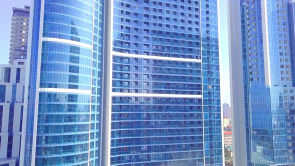 facade of a modern mirrored office building was removed from a drone. close-up