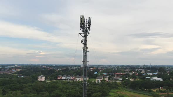 Zoom Out Telecommunication Antenna Tower With 5G And 4G Base Network.