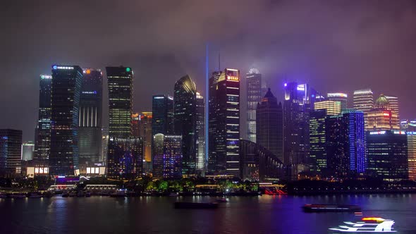 Shanghai River Urban Cityscape Aerial Skyline Panorama Timelapse at Night Zoom Out