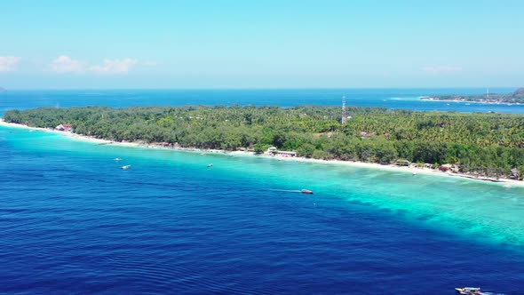 Aerial view seascape of paradise seashore beach voyage by clear ocean and white sandy background of 