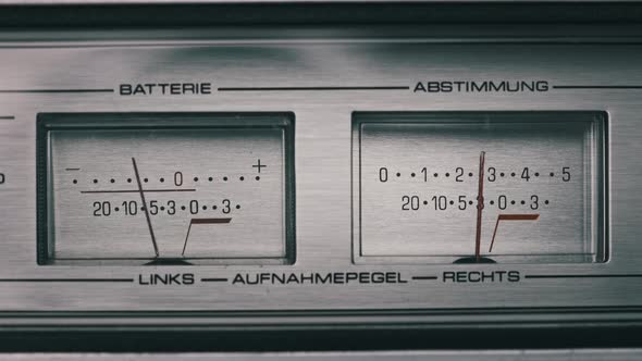 Analog VU Meters on Silver Colored Stereo Tape Recorder Arrow Indicators