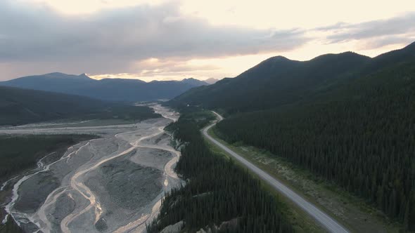 Beautiful View of Scenic Road By Glacial River at Sunset