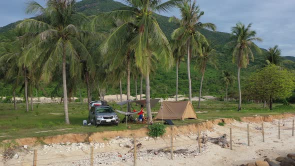 Tent and car on the sea shore