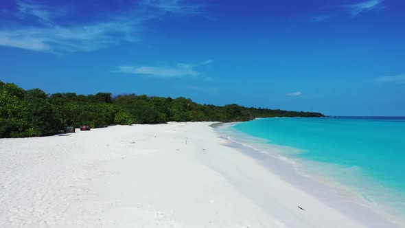 Aerial seascape of idyllic coastline beach time by shallow lagoon and white sandy background of a da