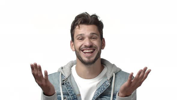 Slowmotion Hopeful and Relieved Cheerful Handsome Bearded Man Raise Hands Up in Pray or Relaxation