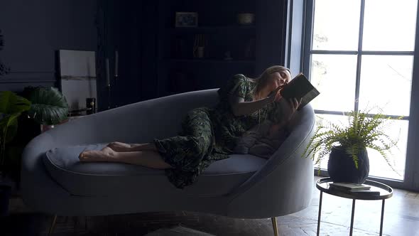 Woman Rests at Home Female Person Reads Book Lying on Sofa Akspb