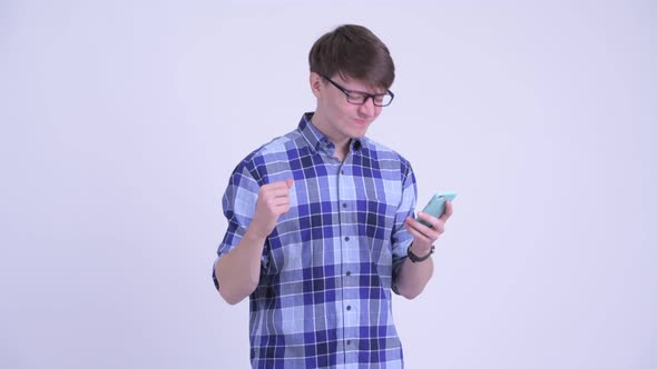 Stressed Young Hipster Man Using Phone and Getting Bad News