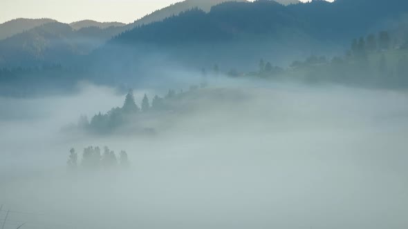 Time Lapse of Flowing Fog in Mountain Landscape